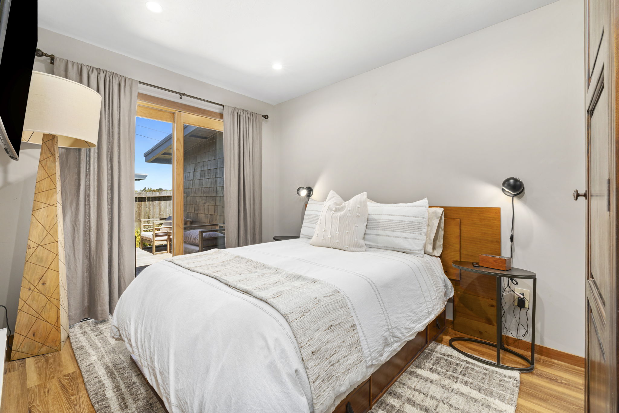 Comfortable bedroom with deck access